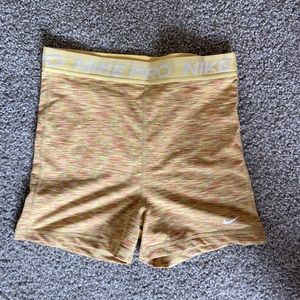 Yellow Nike Pro shorts 5”